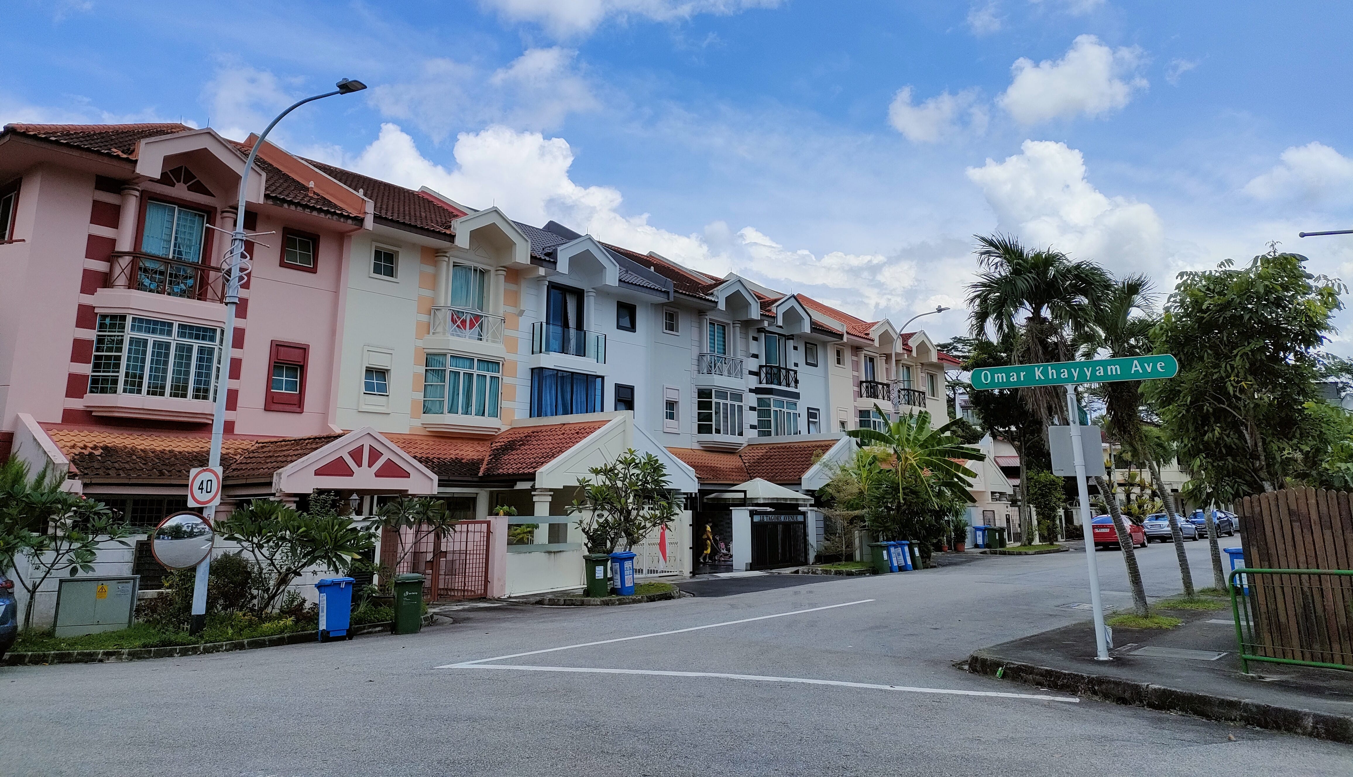 A row of colourful three-storey terrace houses along Tagore Avenue. Photo by Sharon Teng.